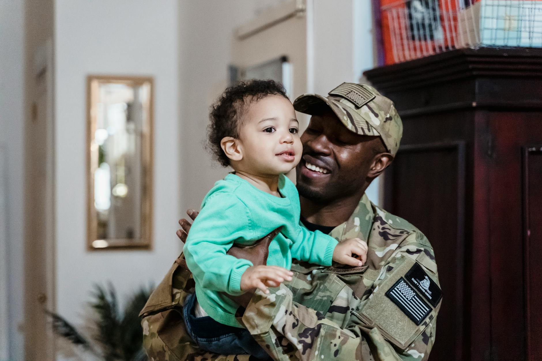 Military parent with child